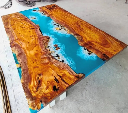 Mesa con río epóxico azul y olas